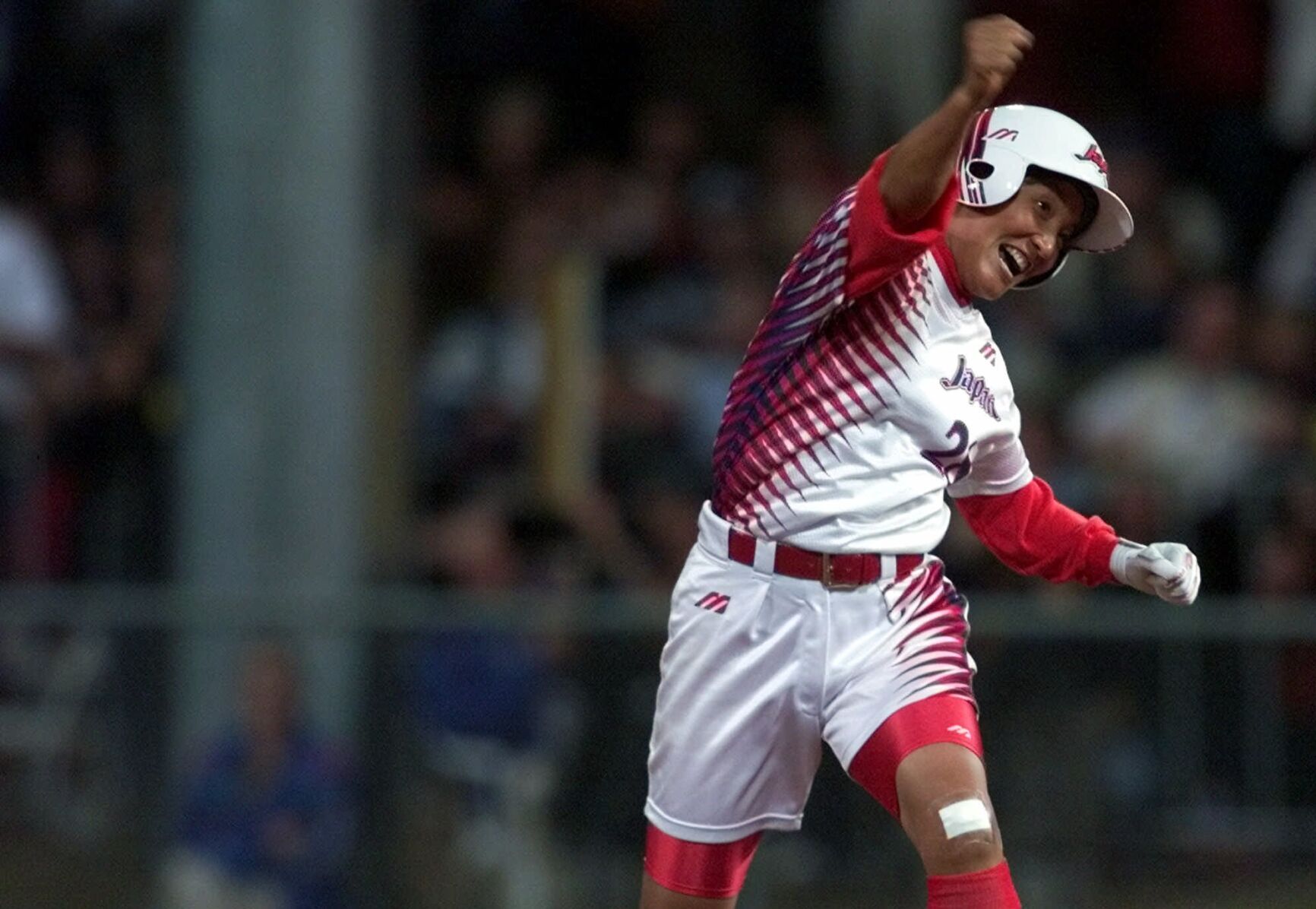 2000: Japan snaps American softball's 112-game winning streak to claim gold